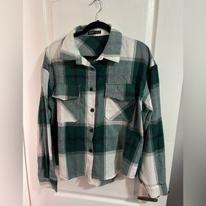 Woman’s size 8/10 green plaid shirt